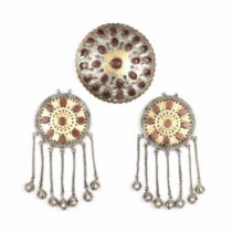 Turkmenistan, Tekke, three circular openworked silver and gilt-silver ornaments, two pectorals with