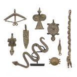 Burkina Faso, Lobi, a collection of seven copper alloy ornaments; herewith a Cameroon pendant an ano