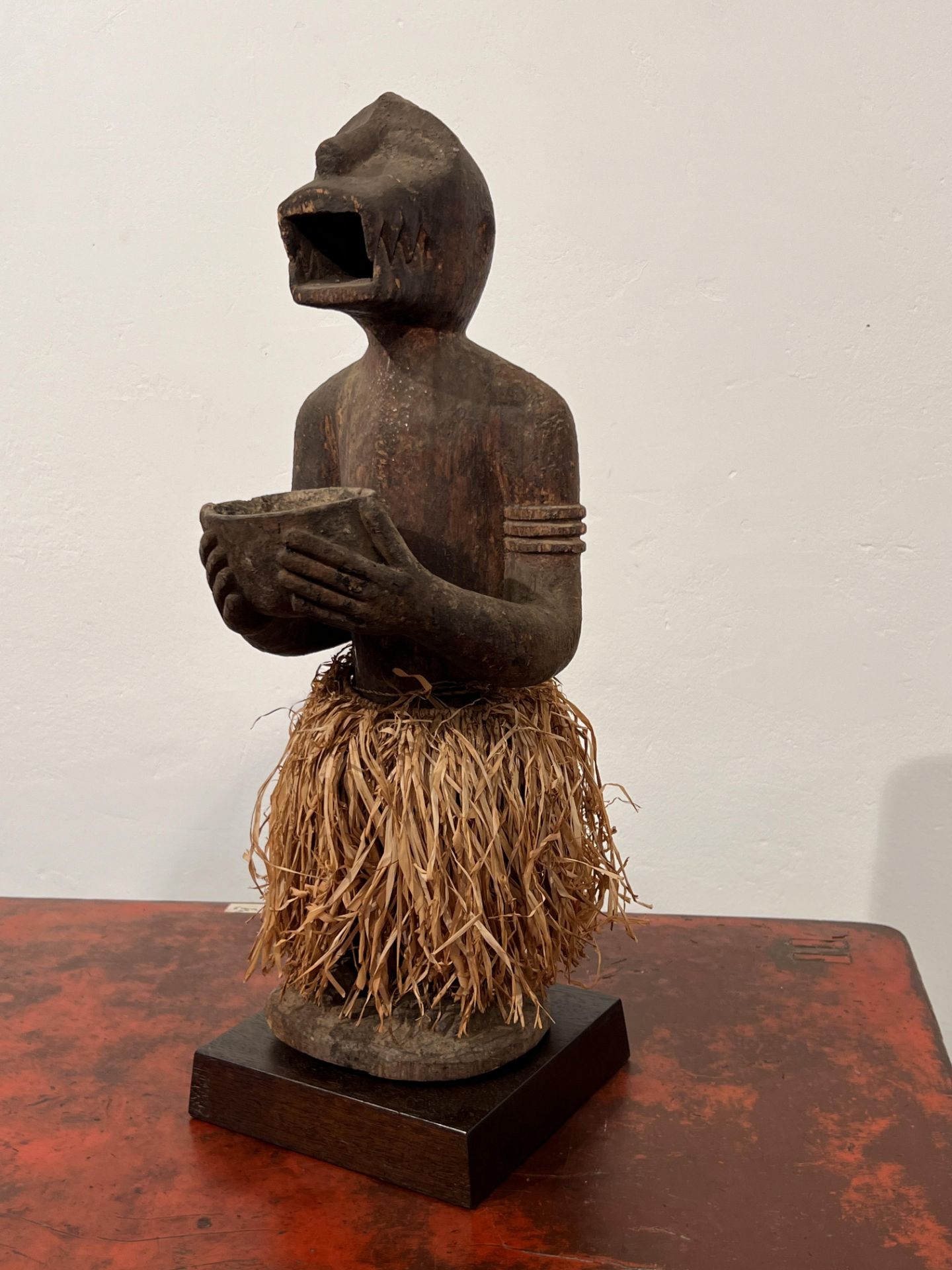 Ivory Coast, Baule, a standing monkey ritual figure, mbra, ca. mid 20th century;