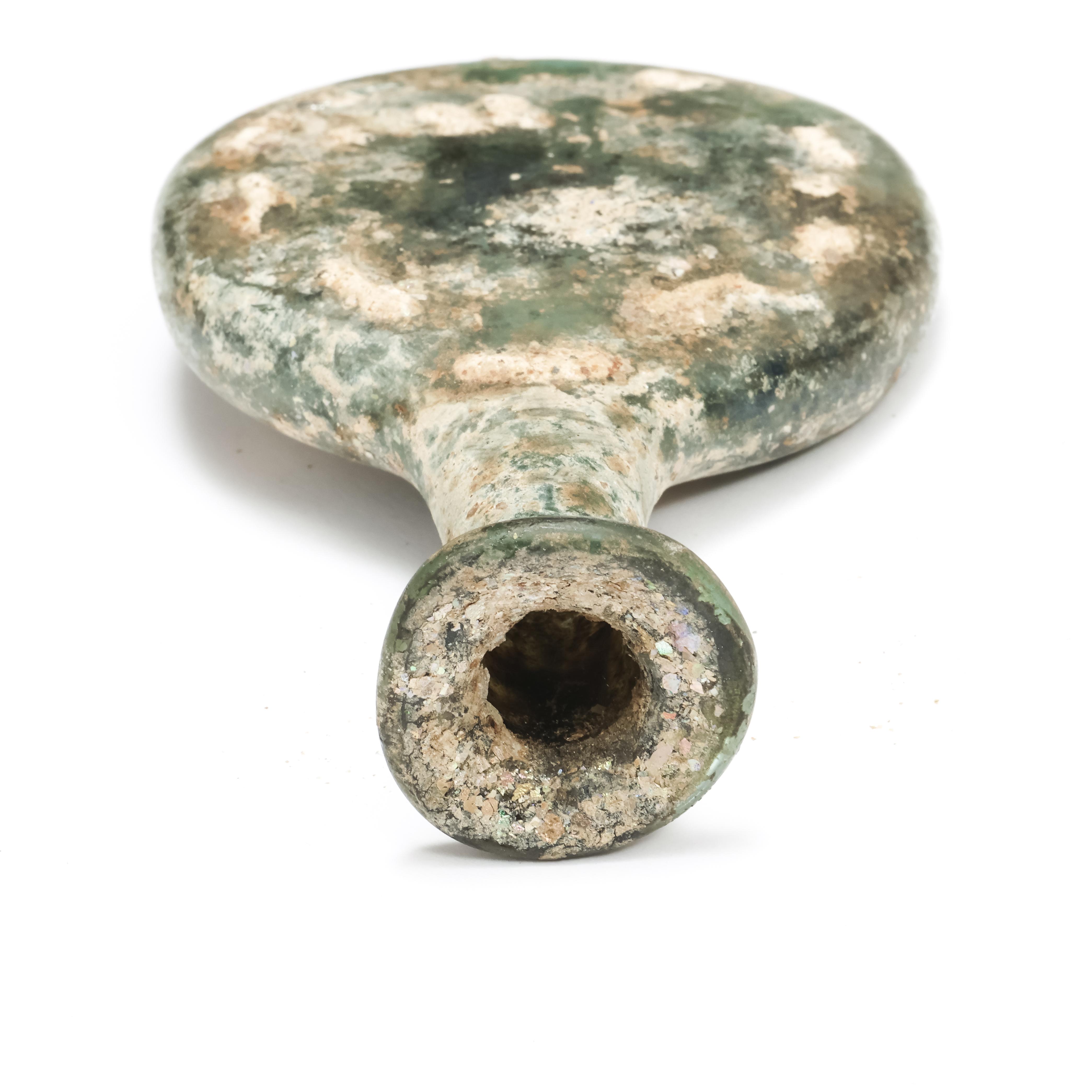 Roman a flat round glass pafum bottle, 3rd century - Image 3 of 4