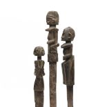 West-Africa, three knives, a.o. Dogon, with a wooden anthropomorphic figure as hilt