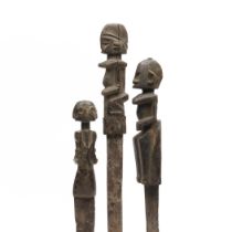 West-Africa, three knives, a.o. Dogon, with a wooden anthropomorphic figure as hilt