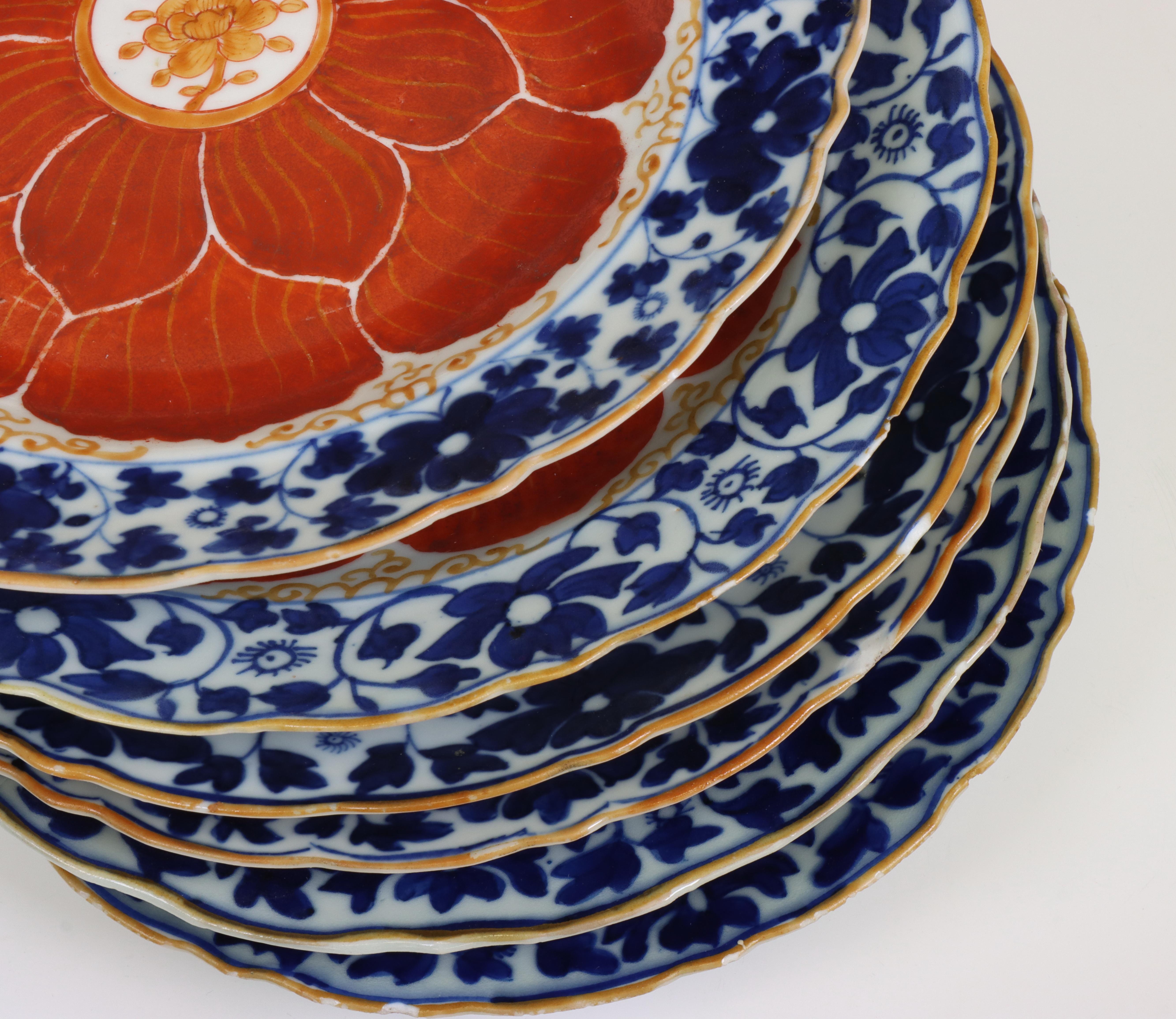 China, set of six blue and white and iron-red porcelain 'lotus' plates, late 18th/ 19th century, - Image 3 of 4