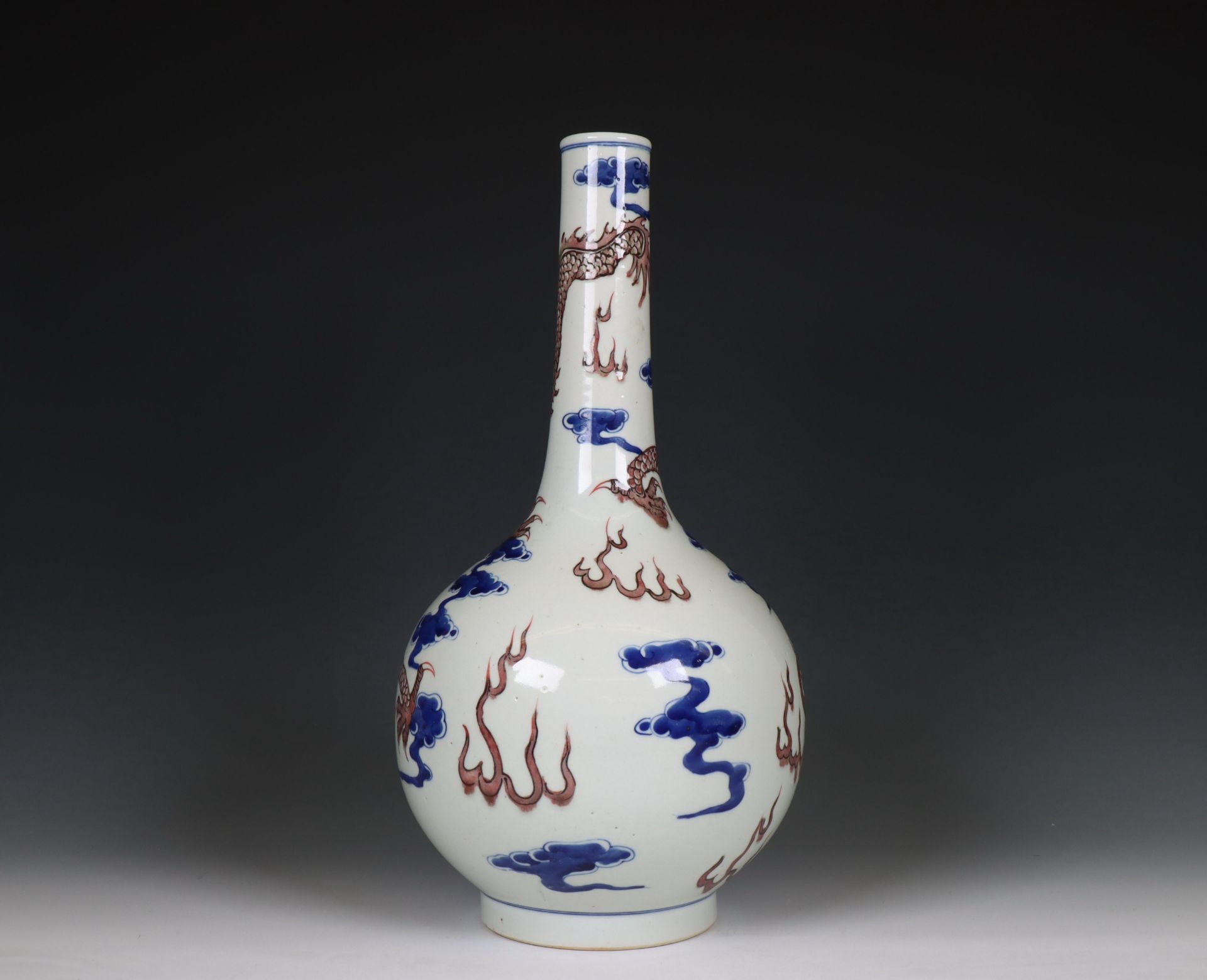 China, a blue and white and iron-red porcelain 'dragon' bottle vase, 20th century, - Image 5 of 5