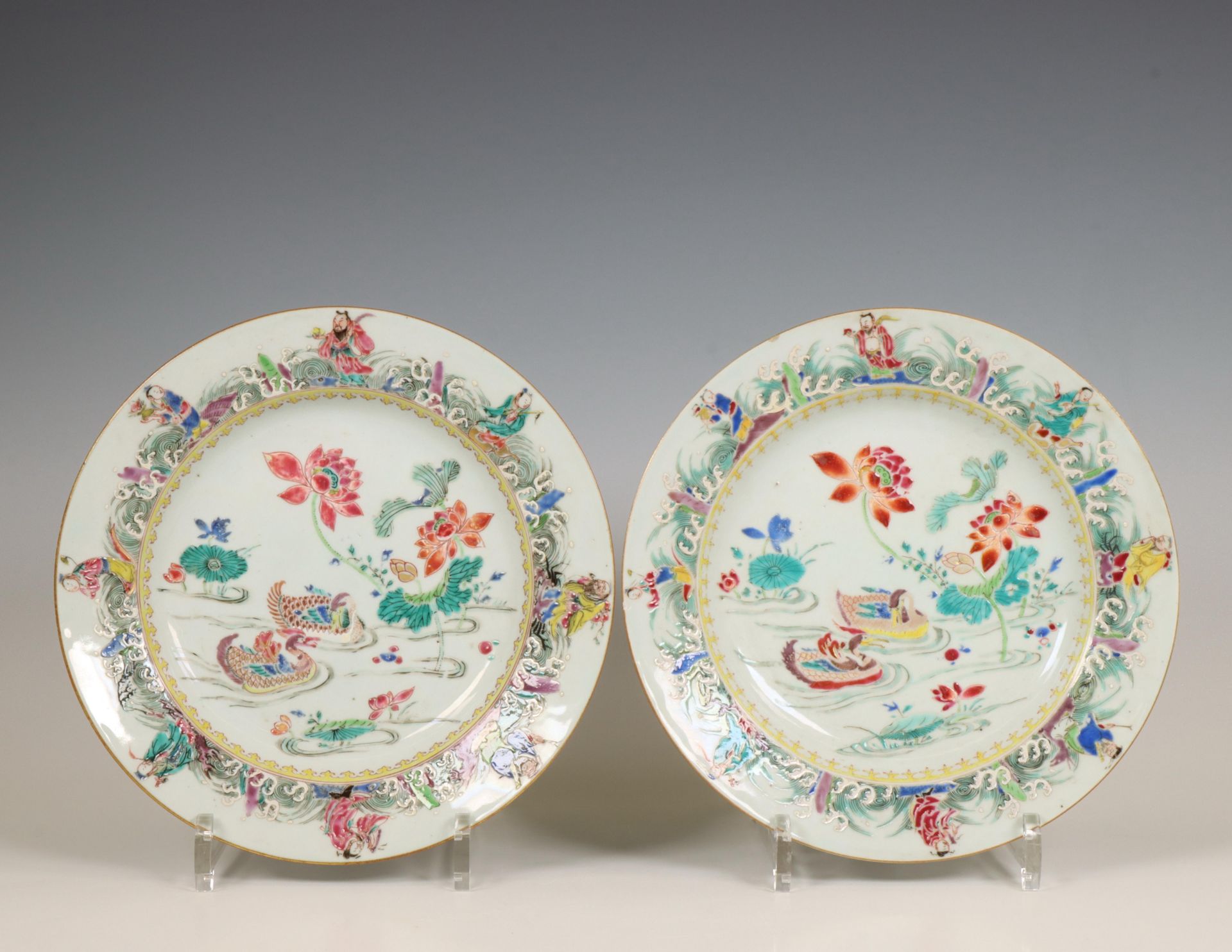 China, a pair of famille rose 'Mandarin ducks and Daoist Immortals' plates, ca. 1740,