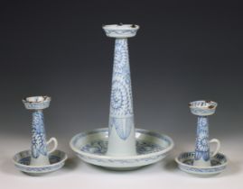 China, three blue and white porcelain candlesticks, 20th century,