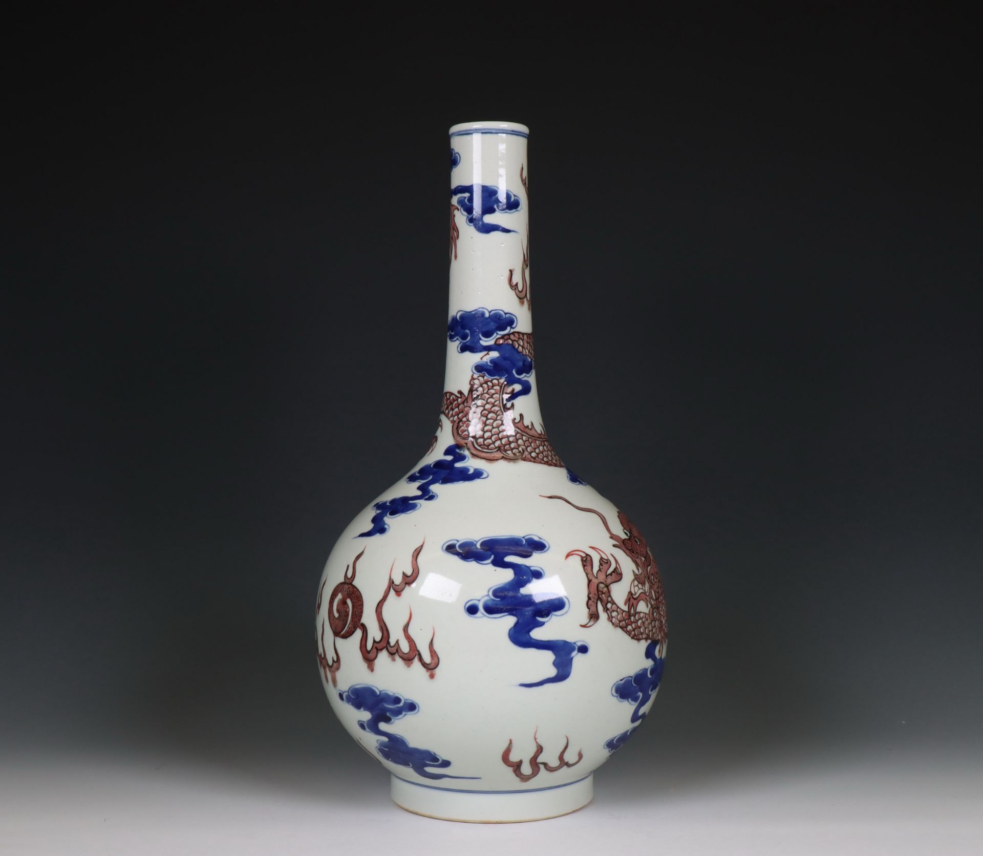 China, a blue and white and iron-red porcelain 'dragon' bottle vase, 20th century, - Image 2 of 5