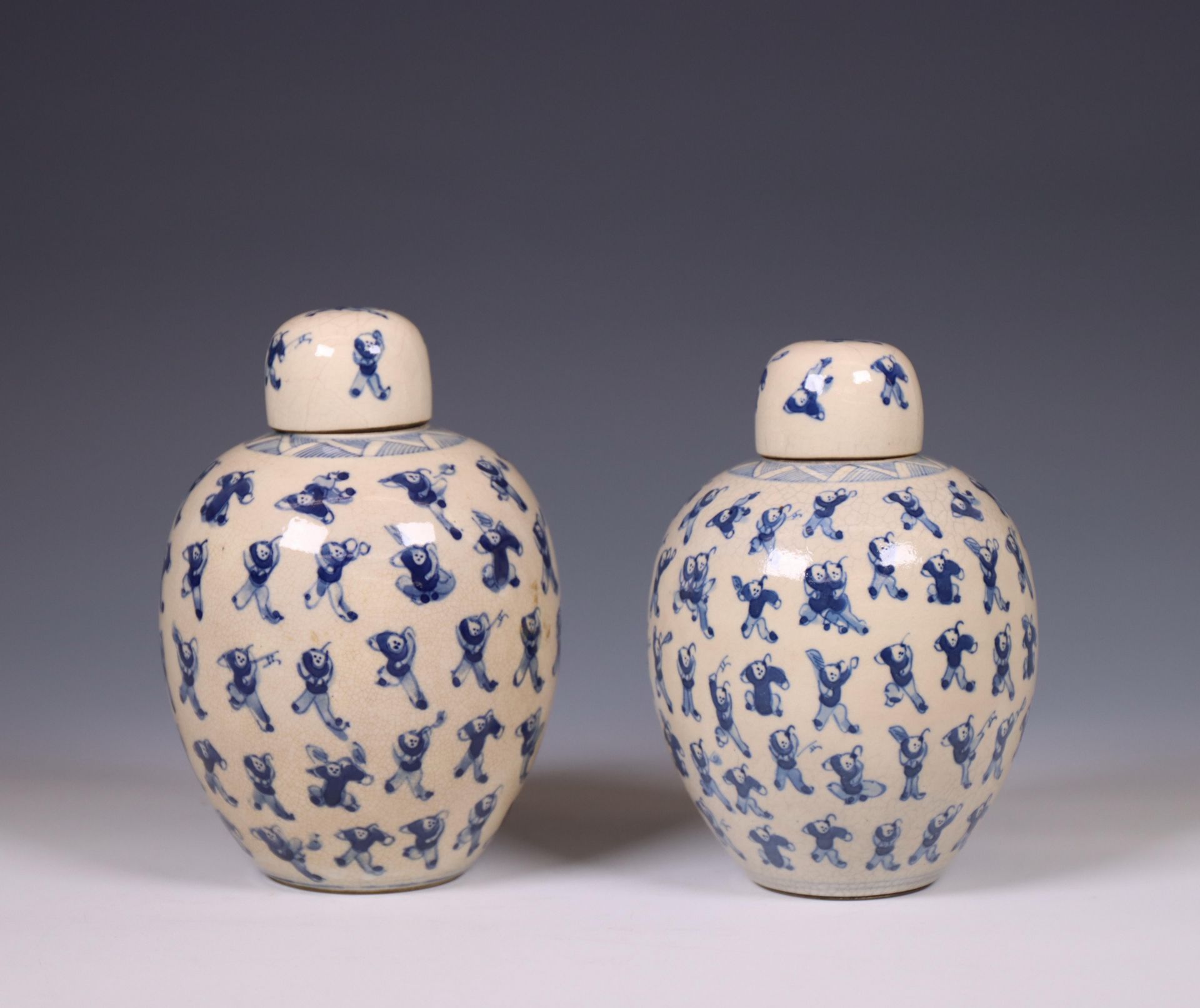 China, a pair of soft paste blue and white 'one hundred boys' jars and covers, 19th century, - Image 2 of 6