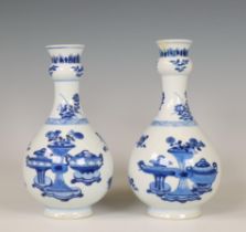 China, a pair of blue and white garlic-head vases, Kangxi period (1662-1722),