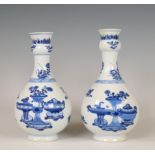 China, a pair of blue and white garlic-head vases, Kangxi period (1662-1722),