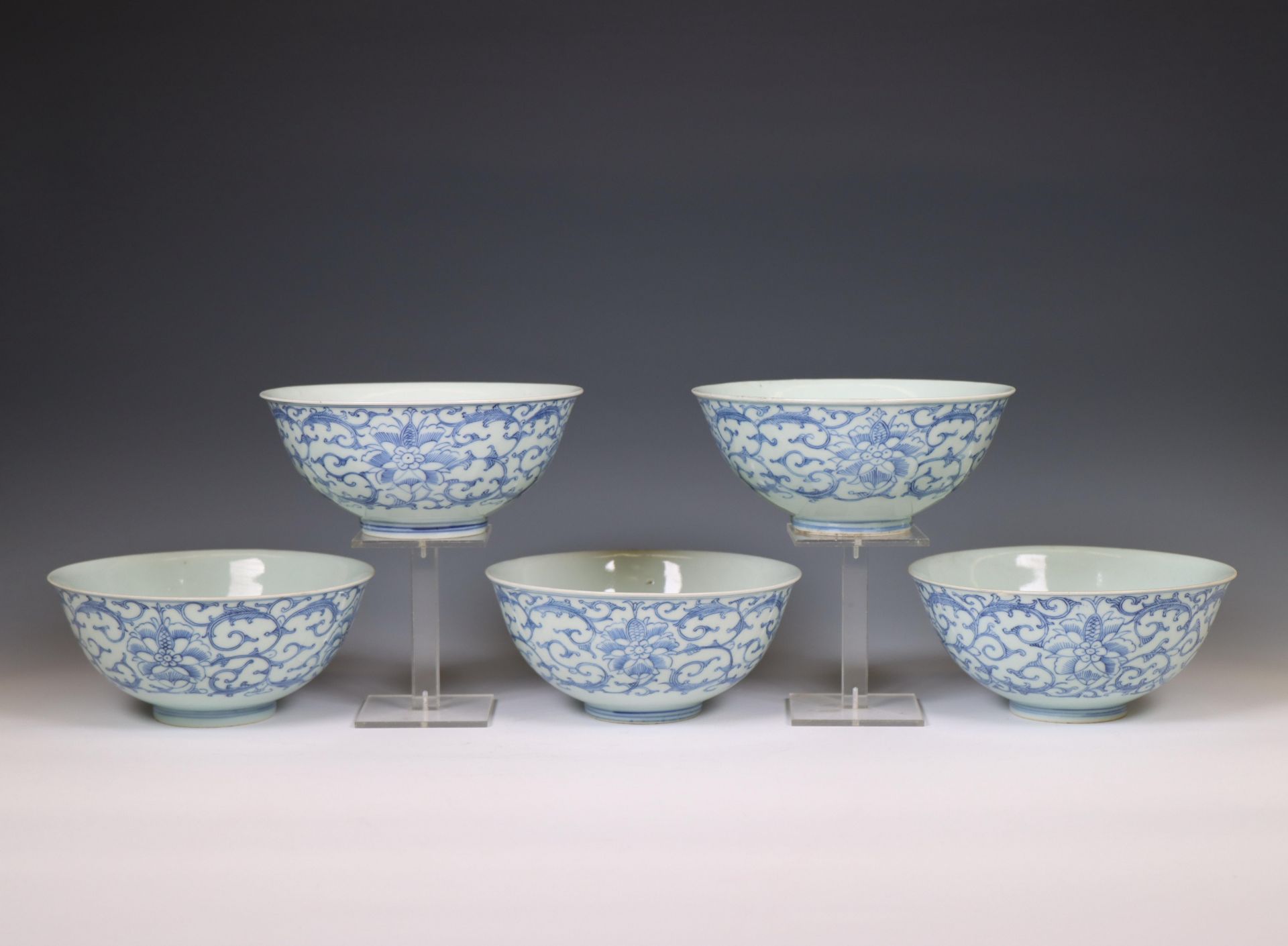 China, a set of five blue and white porcelain bowls, 20th century,