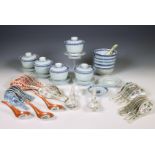 China, a collection of porcelain rice-bowls and spoons, modern,