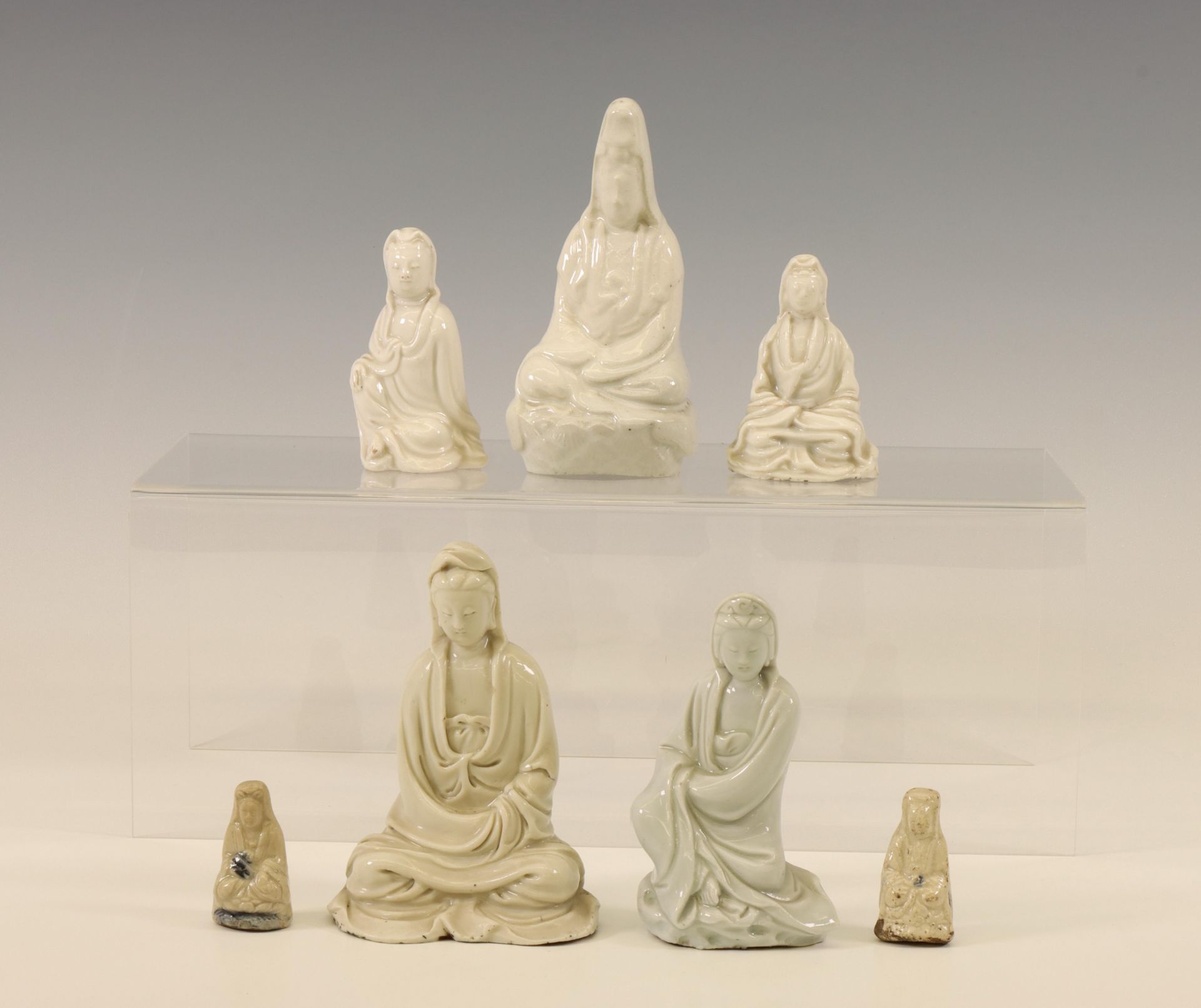 China, a group of small Dehua and white-glazed Guanyins, 20th century-modern,