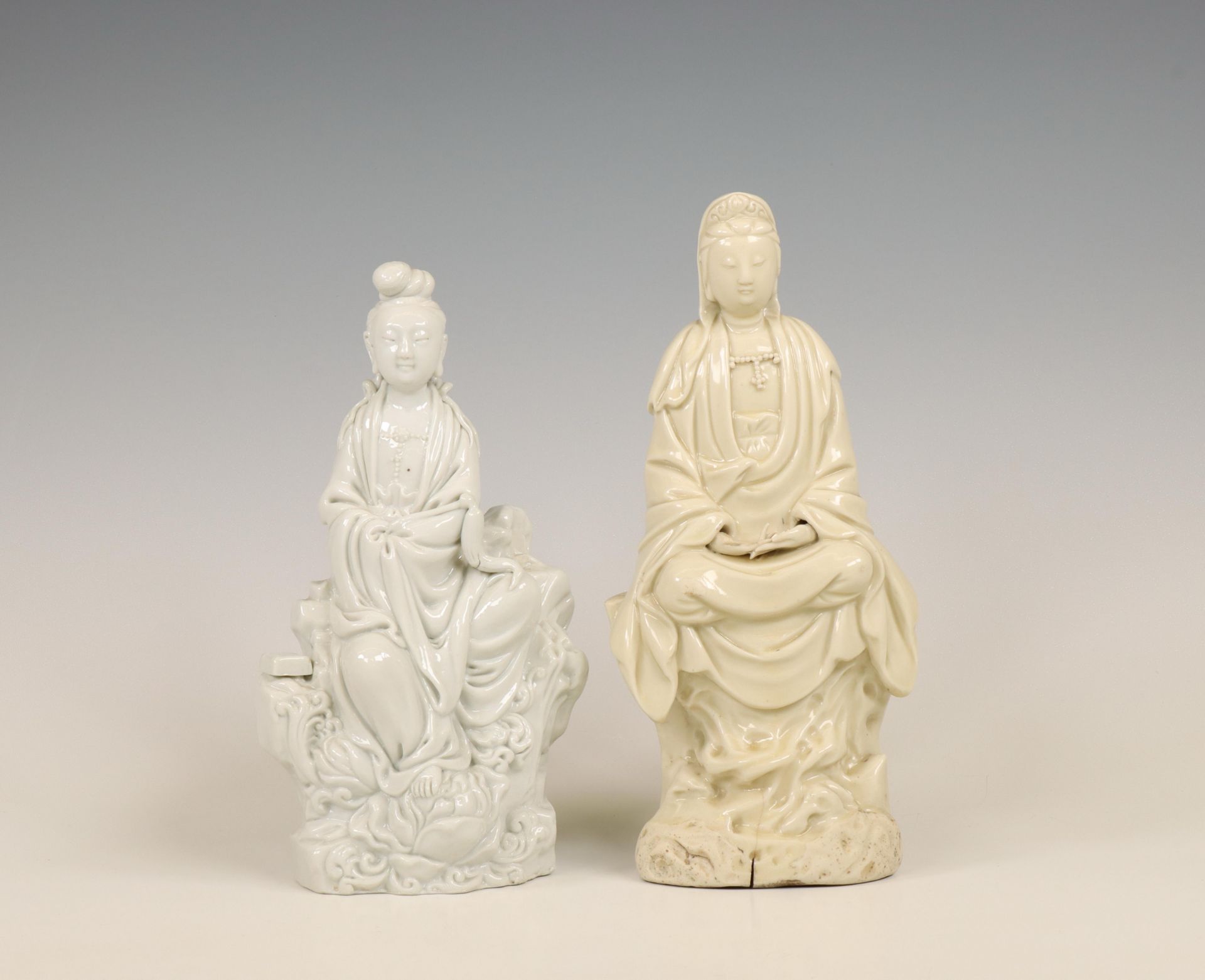 China, two Dehua/ white-glazed porcelain figures of Guanyin, 20th century,