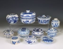 China, a collection of blue and white porcelain boxes and covers, 19th-20th century,