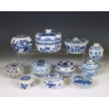 China, a collection of blue and white porcelain boxes and covers, 19th-20th century,