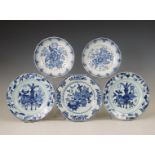 China, three blue and white plates and a pair of trivets, Qianlong period (1736-1795),