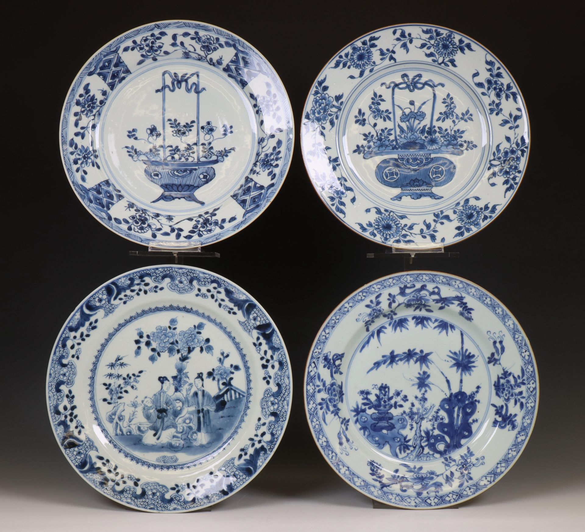 China, four various large blue and white porcelain plates, 18th century,