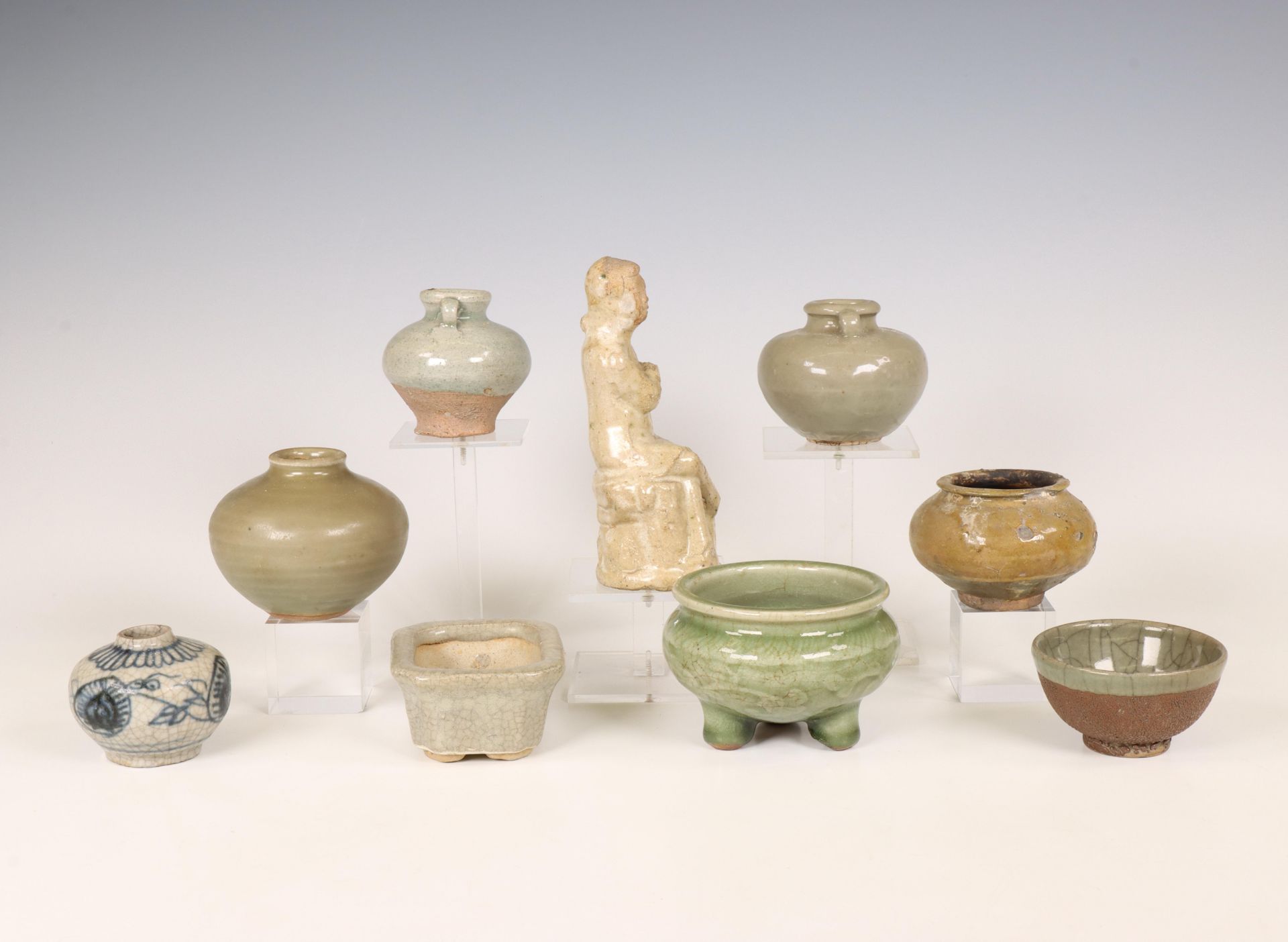 China and Southeast Asia, a collection of celadon and cream-glazed jars and a figure, Ming dynasty ( - Image 3 of 5