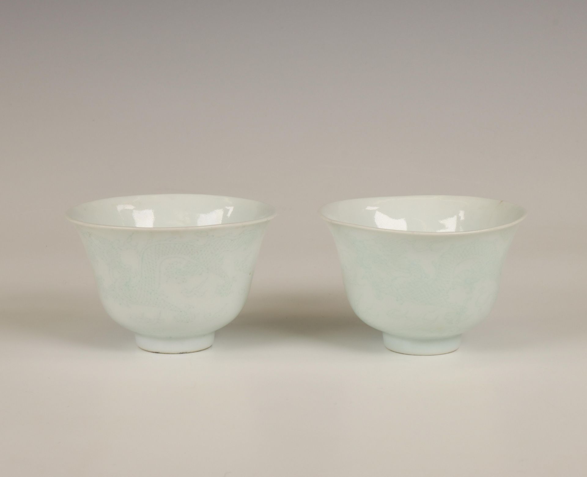 China, pair of sgraffito porcelain 'dragon' cups, 20th century,