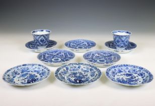China, a set of two blue and white porcelain cups and five saucers and a set of three saucers, Kangx