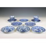 China, a set of two blue and white porcelain cups and five saucers and a set of three saucers, Kangx