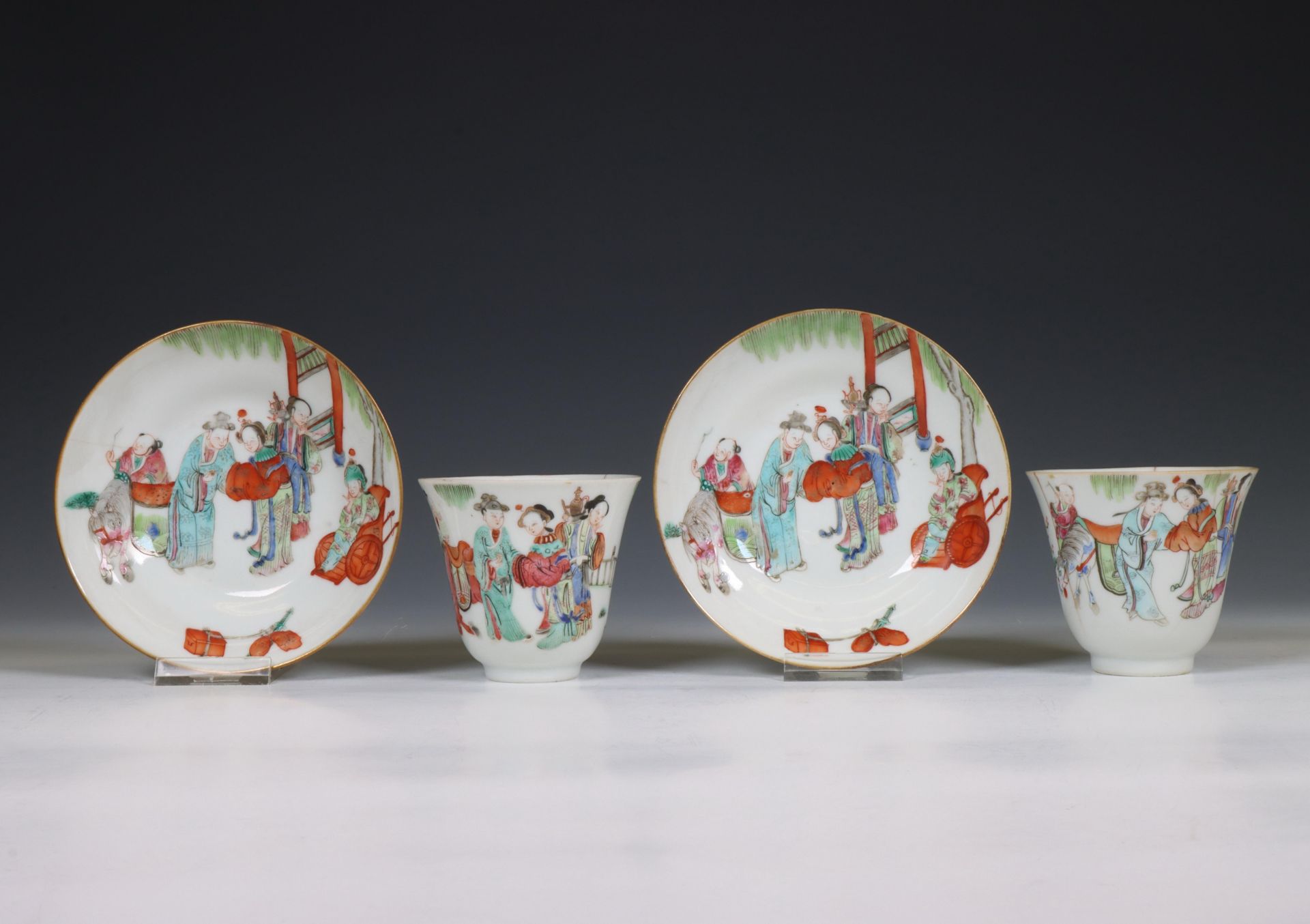 China, a pair of famille rose porcelain cups and saucers, 19th century,