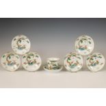 China, a set of seven famille verte auspicious 'deer and monkey' saucers with one cup, late 19th/ ea