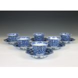 China, a set of seven blue and white porcelain cups and six saucers, Kangxi period (1662-1722),