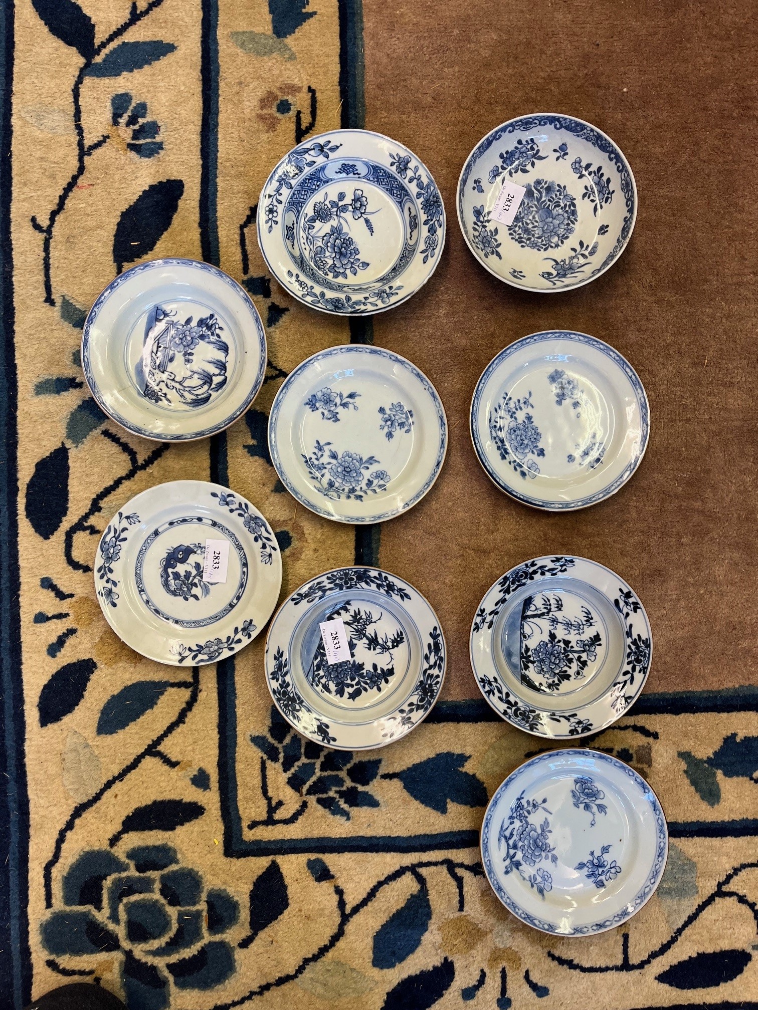 China, a collection of blue and white porcelain plates and saucer dishes, Qianlong period (1736-1795