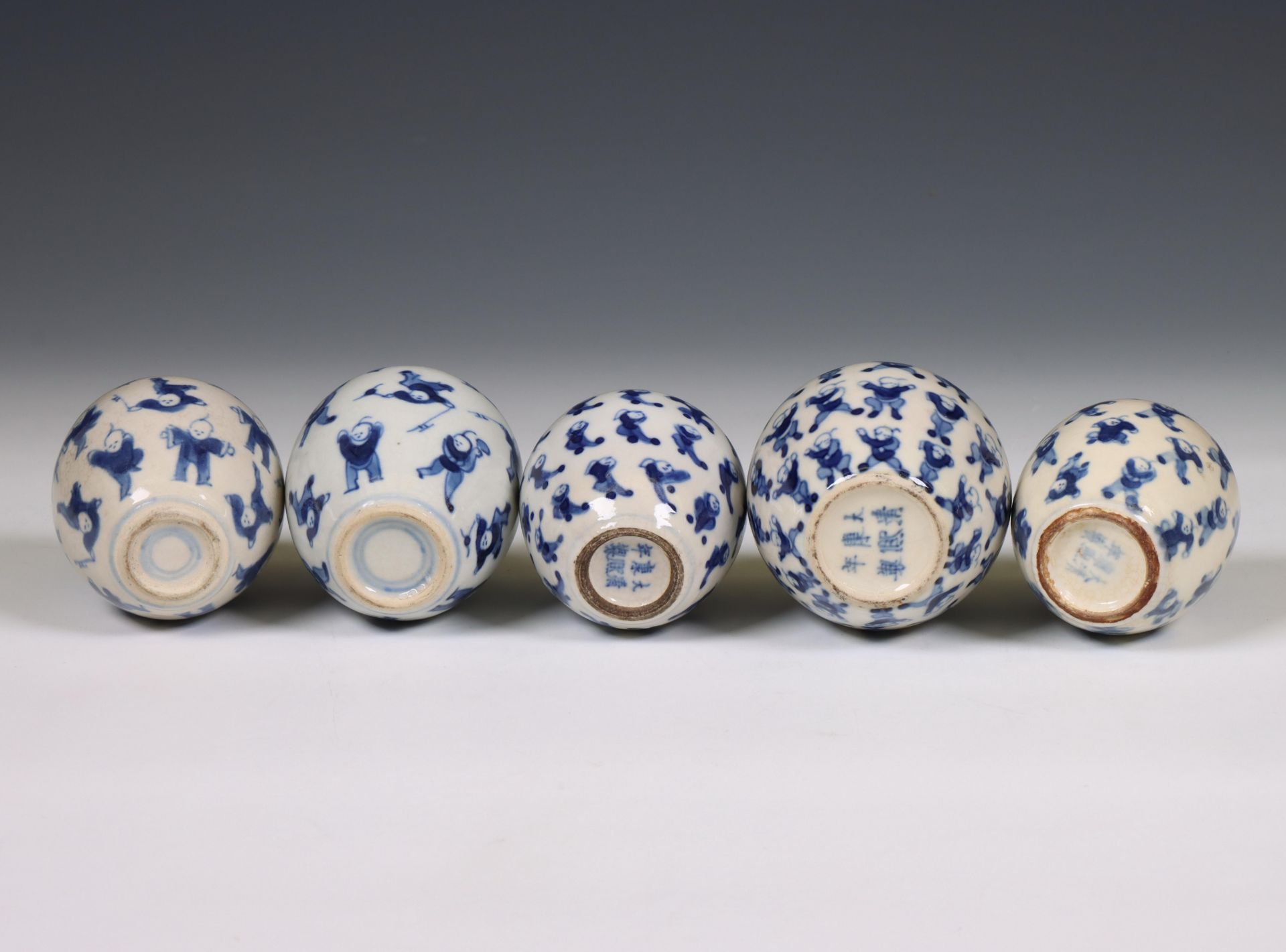 China, five soft paste blue and white 'one hundred boys' jarlets, 19th century, - Image 4 of 5