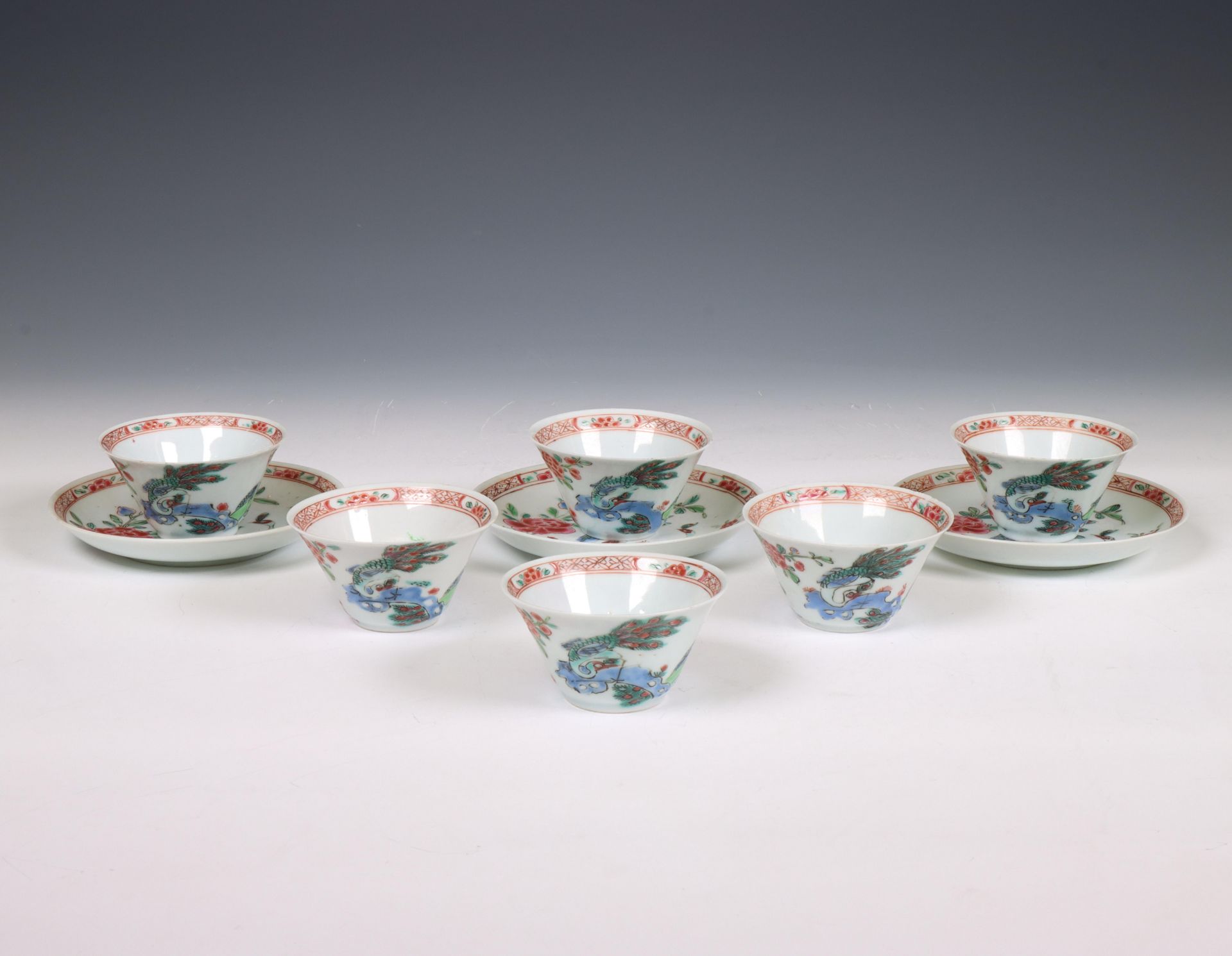 China, a set of six famille rose porcelain cups and three saucers, Qianlong period (1736-1795),