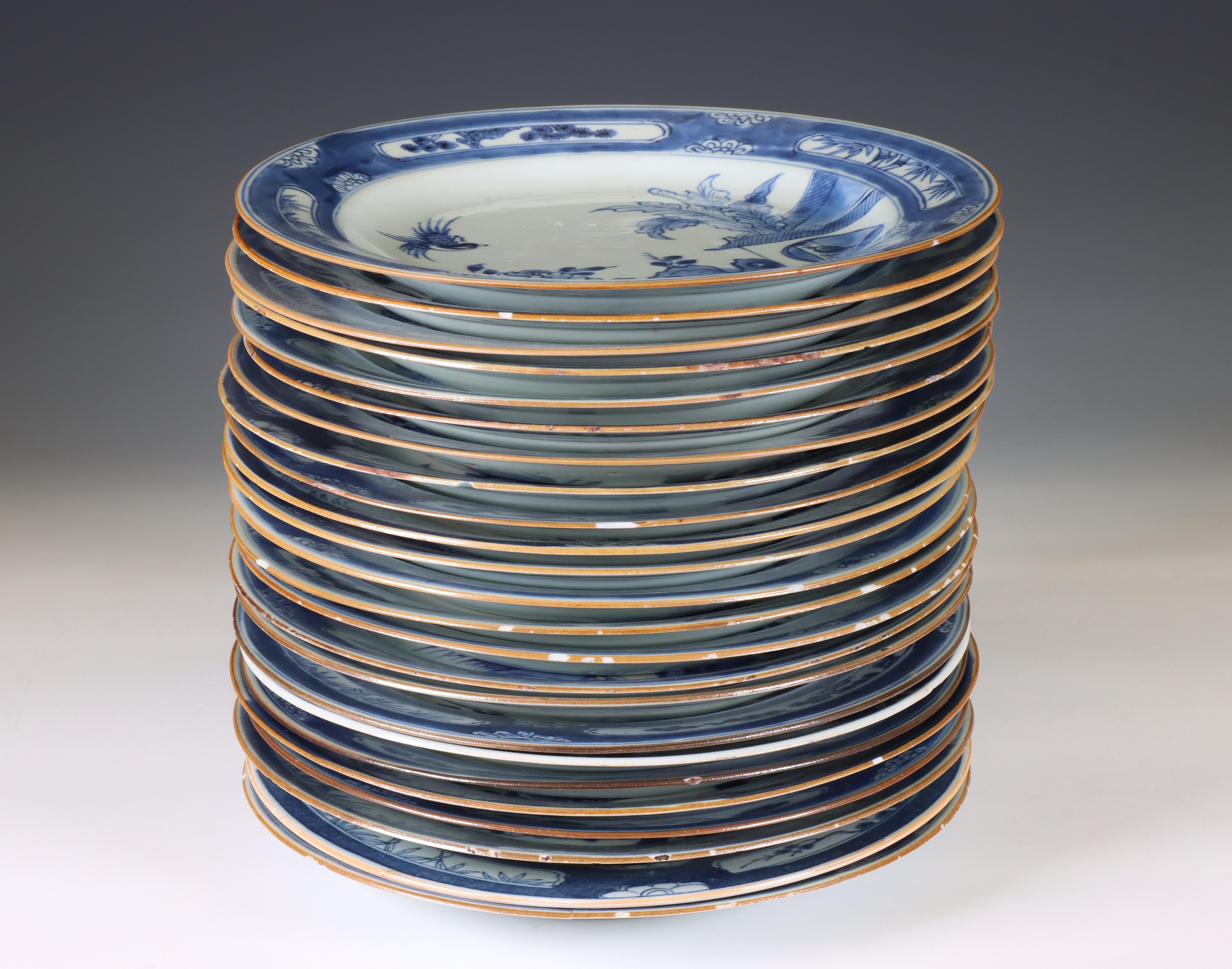 China, a set of twenty-four blue and white porcelain 'Cuckoo in the House' plates, 18th century, - Image 2 of 2