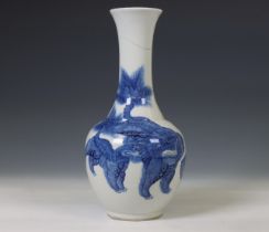 China, blue and white porcelain 'Buddhist lion' bottle vase, 19th century,