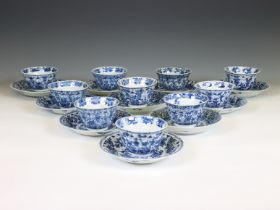 China, a set of ten blue and white porcelain cups and twelve saucers, Kangxi period (1662-1722),