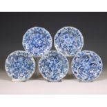 China, a set of five blue and white moulded deep saucers, Kangxi period (1662-1722),