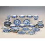 China, a large collection of blue and white porcelain cups and saucers, Kangxi period (1662-1722) an