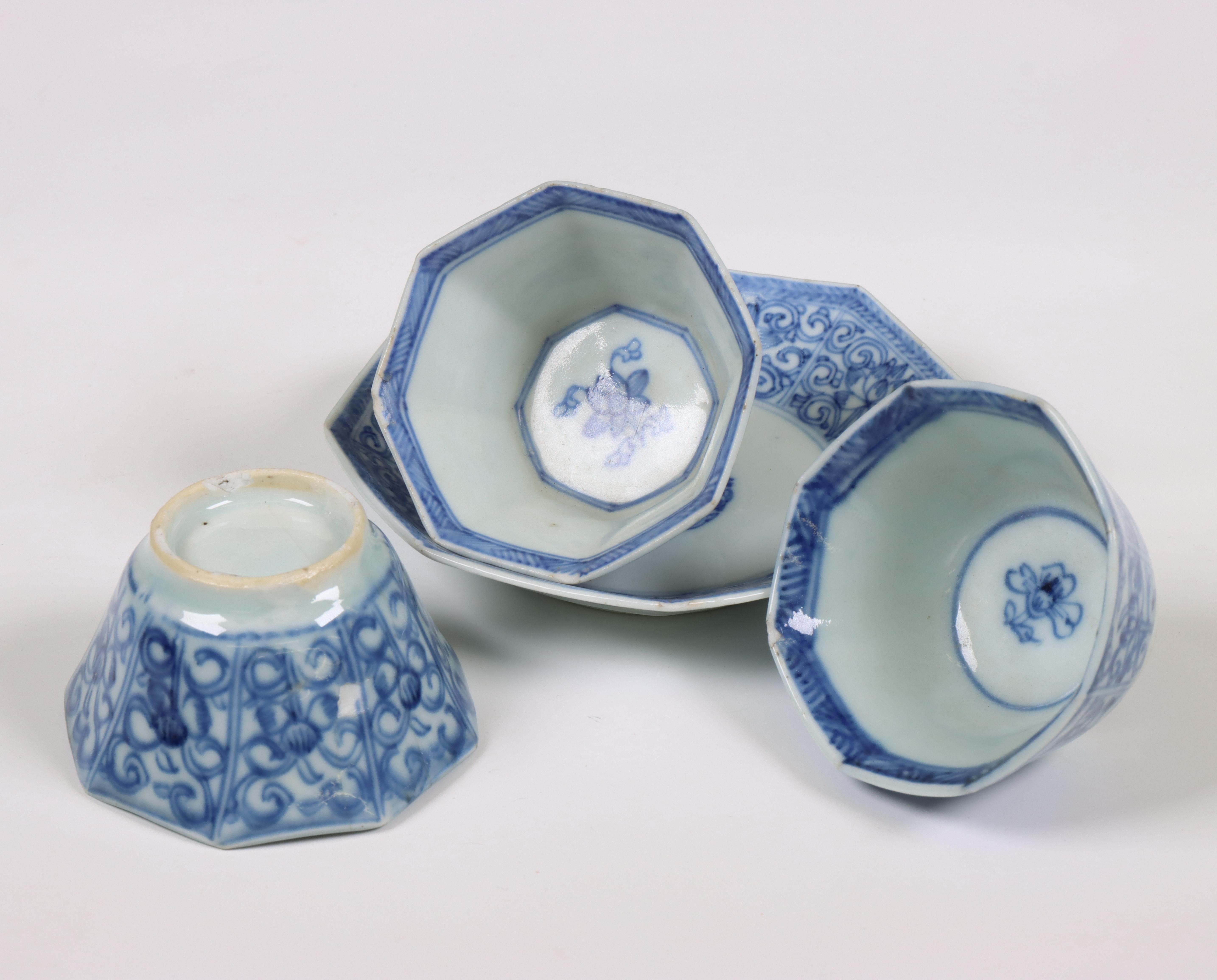 China, a set of blue and white porcelain octagonal 'lotus' cups and two sets of saucers, 18th centur - Image 3 of 4