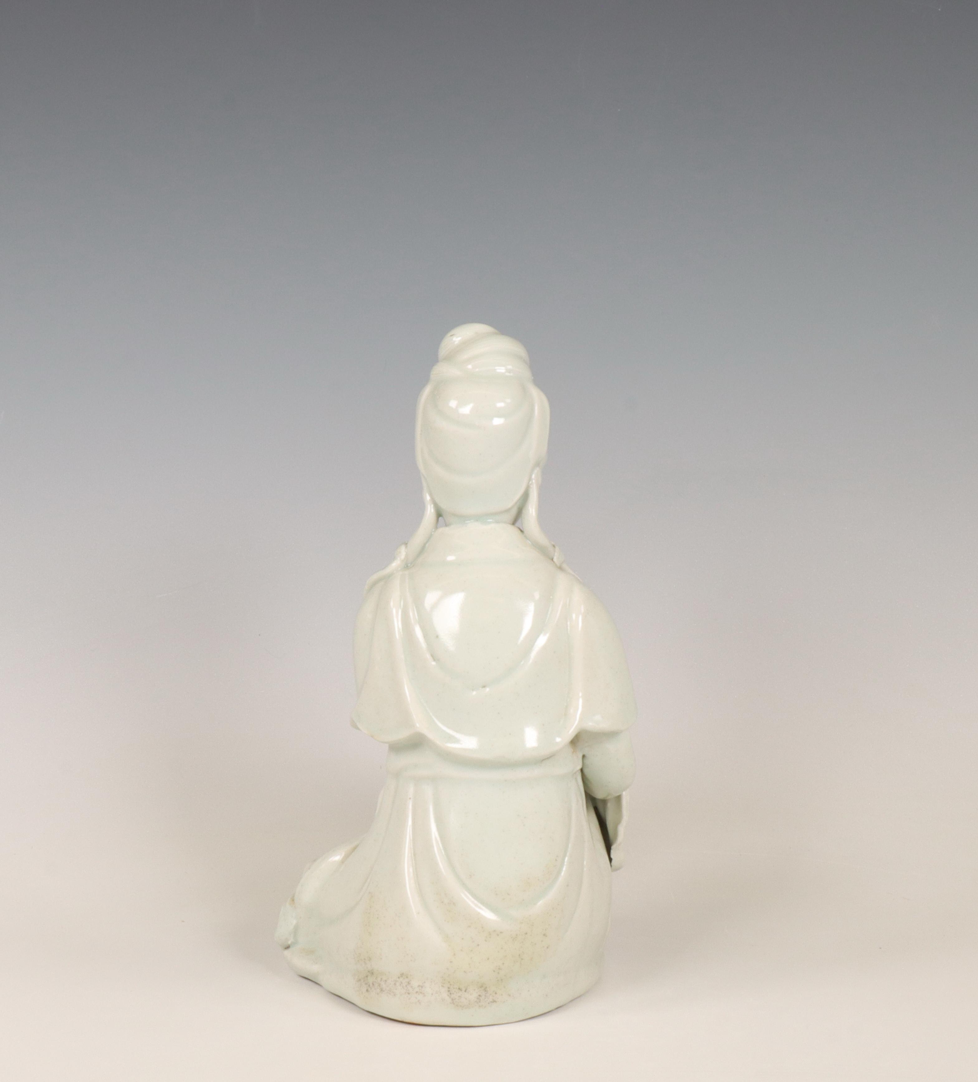 China, a white-glazed porcelain figure of Guanyin, ca. 1900, - Image 2 of 2