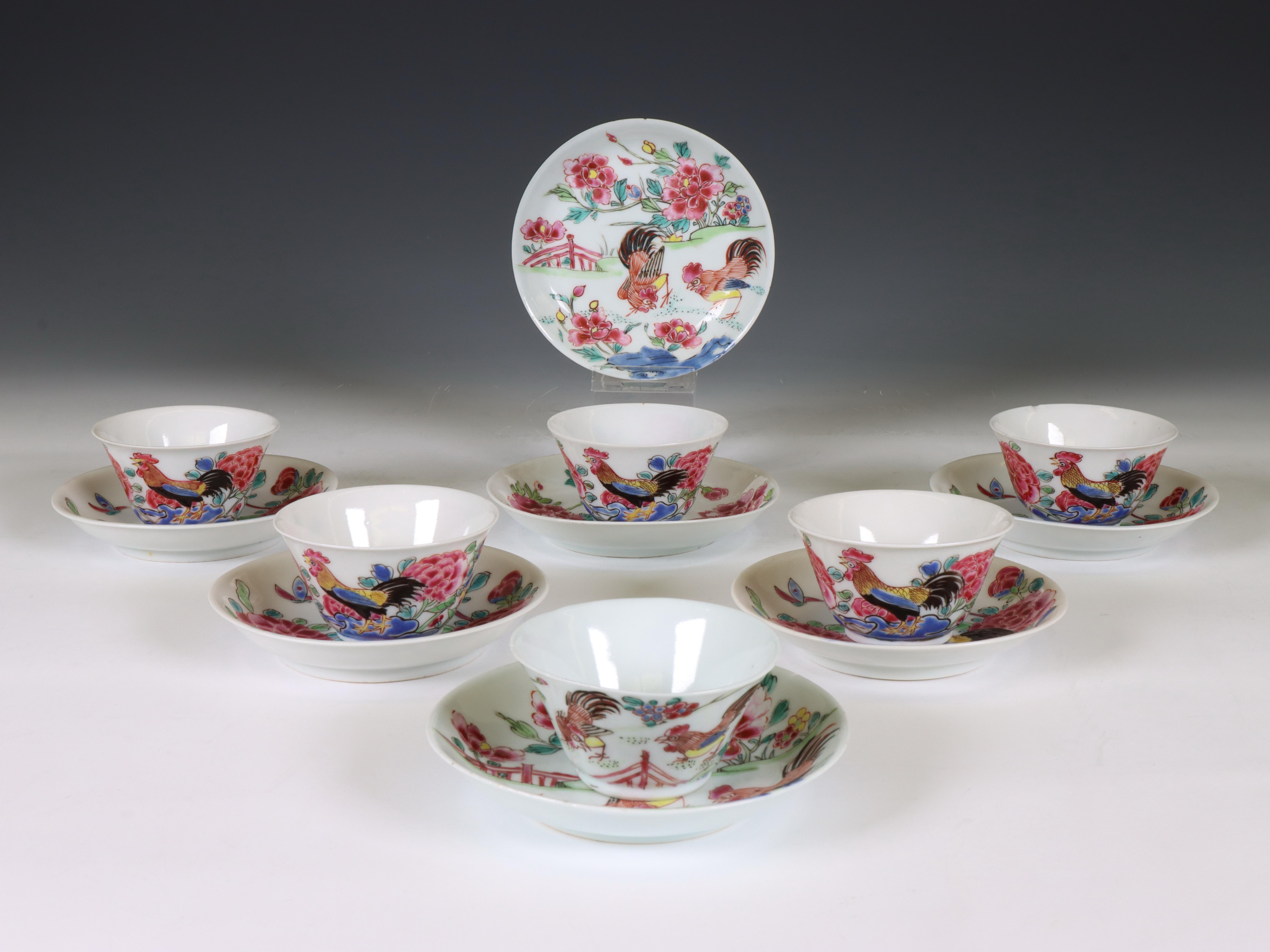 China, an associated set of six famille rose porcelain 'cockerel' cups and seven saucers, 18th/ 19th