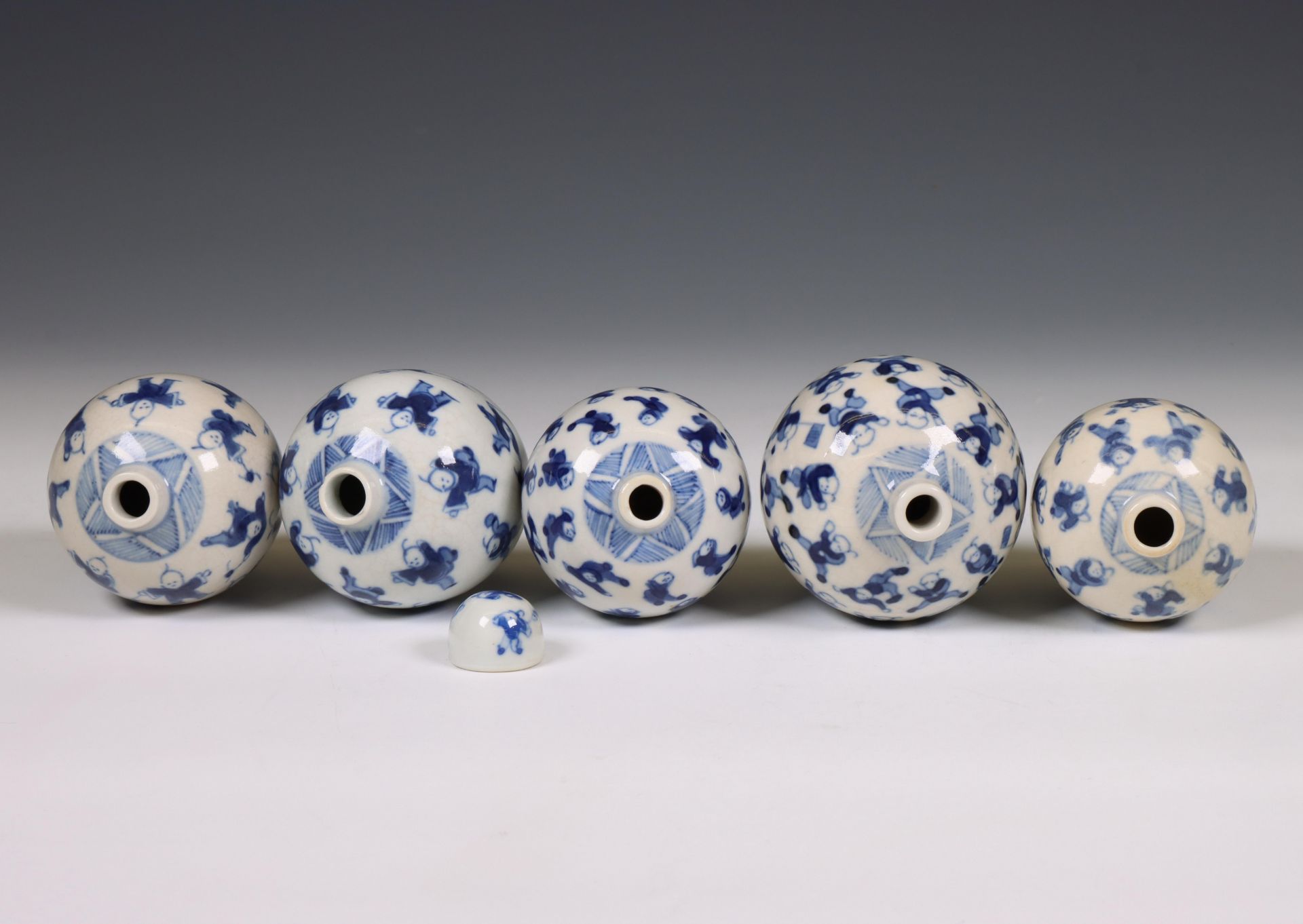 China, five soft paste blue and white 'one hundred boys' jarlets, 19th century, - Image 3 of 5