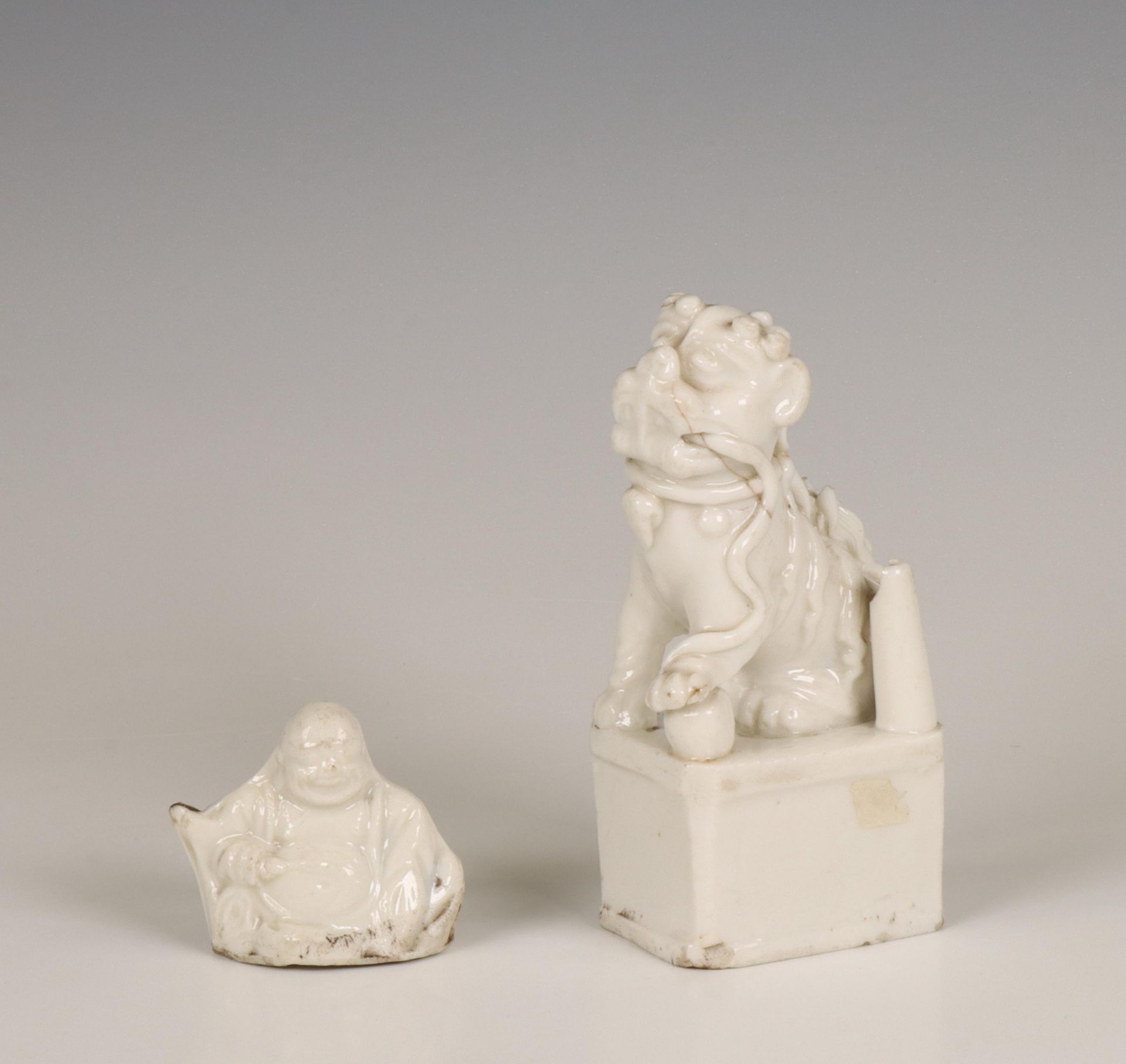 China, a Dehua porcelain joss-stick holder and a whistle, 18th century,