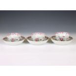 China, a set of three famille rose porcelain cups and saucers, late 18th century,