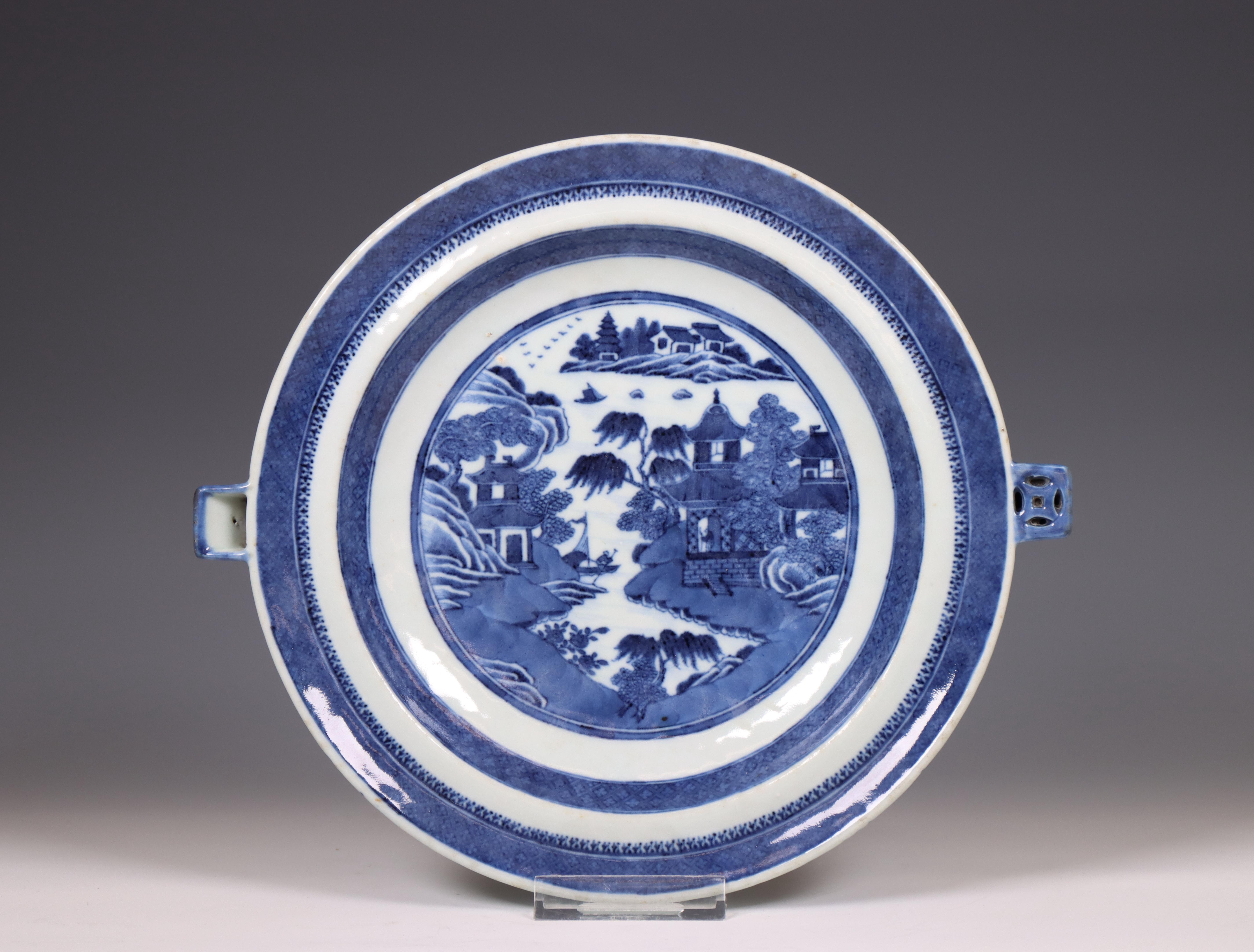 China, a Canton blue and white hot-water plate, 19th century,