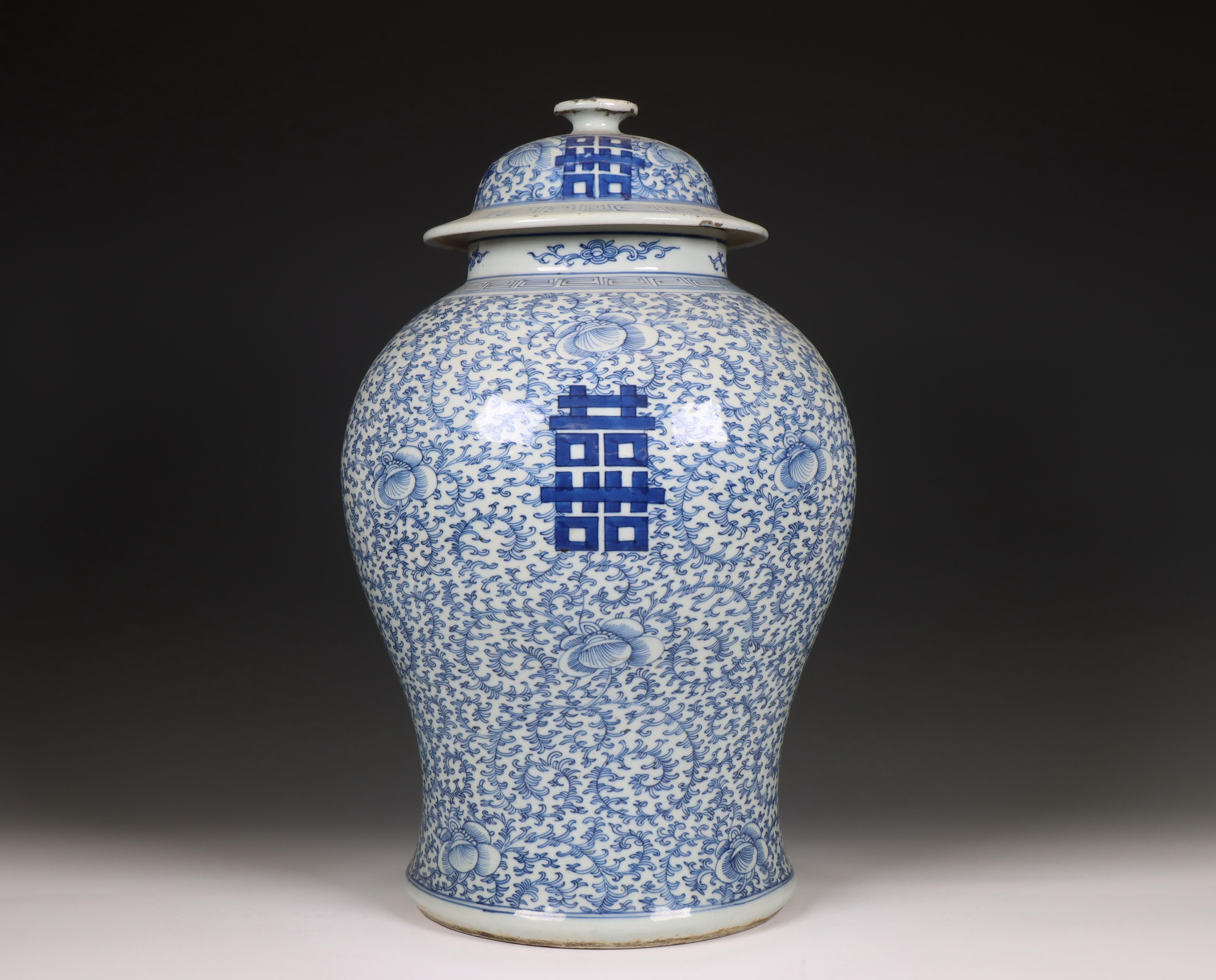 China, a blue and white porcelain baluster vase and cover, ca. 1900,