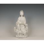 China, a Dehua porcelain figure of Guanyin, 19th/ 20th century,