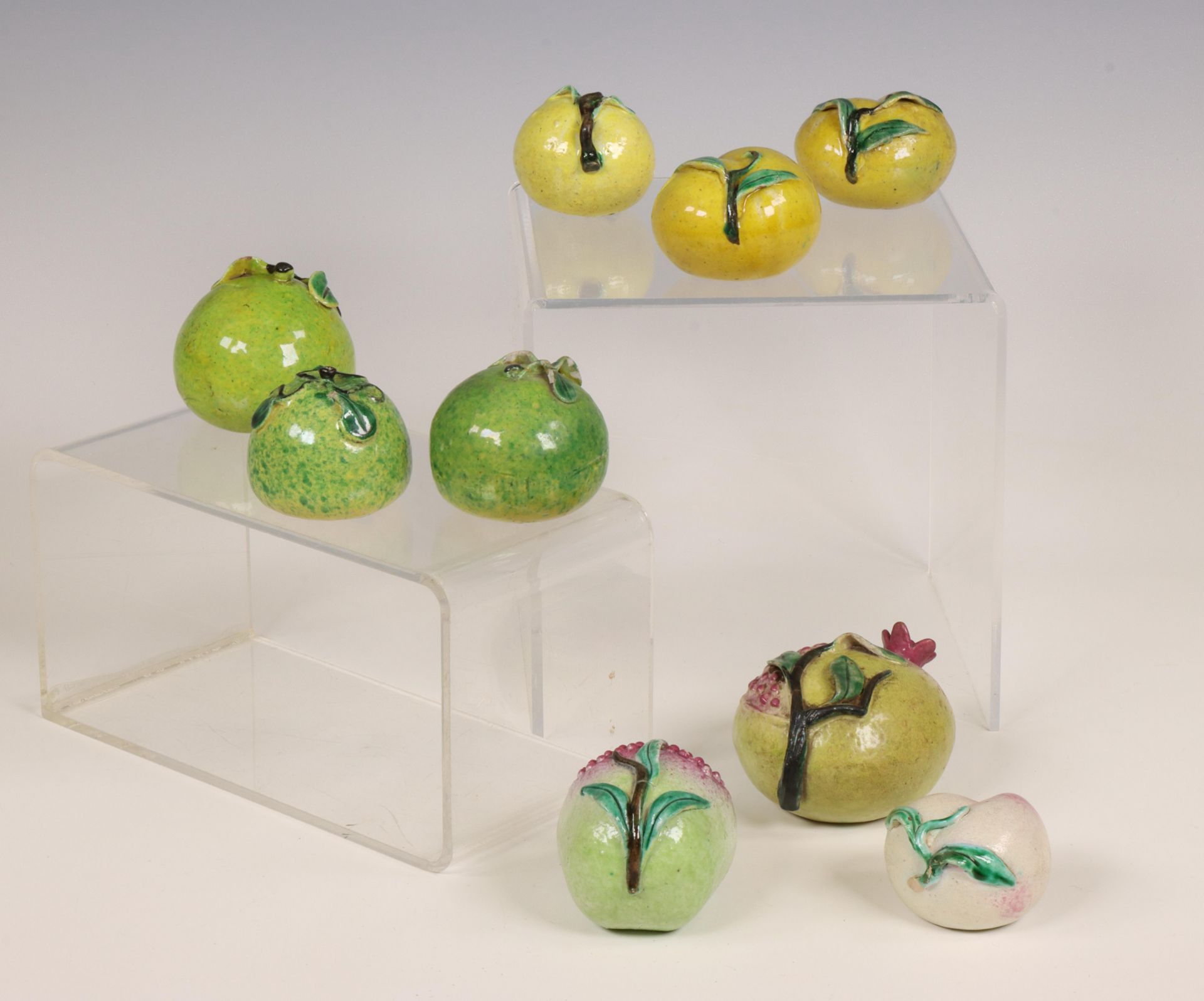 China, a collection of nine famille rose porcelain models of various fruits, 19th century,