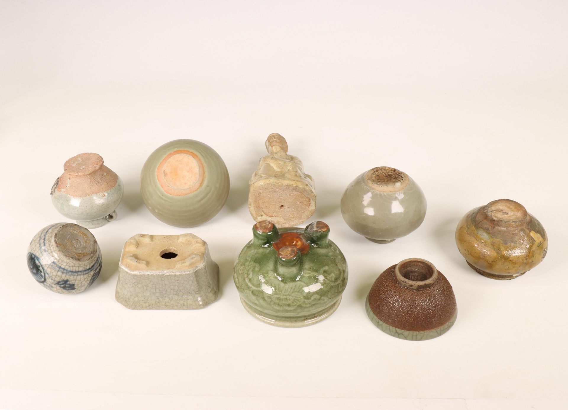 China and Southeast Asia, a collection of celadon and cream-glazed jars and a figure, Ming dynasty ( - Image 4 of 5