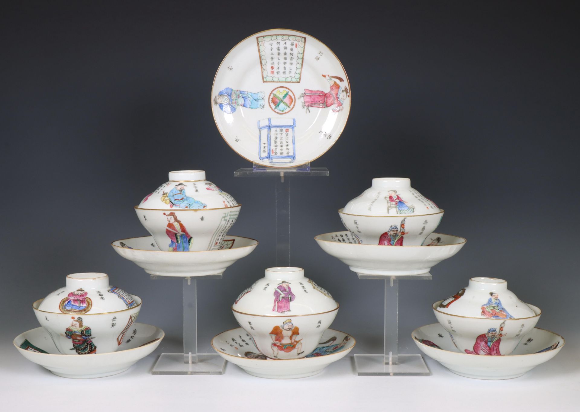 China, a collection of famille rose porcelain 'Wu Shuang Pu' ogee-form cups, covers and saucers, 19t