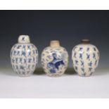 China, a pair of soft paste blue and white 'one hundred boys' jars and A 'buddhist lion' jar, 19th c